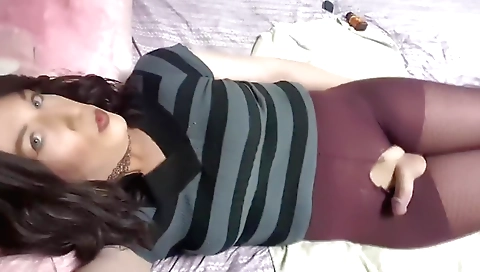 Sexy shemale with good tits is masturbating with dildo