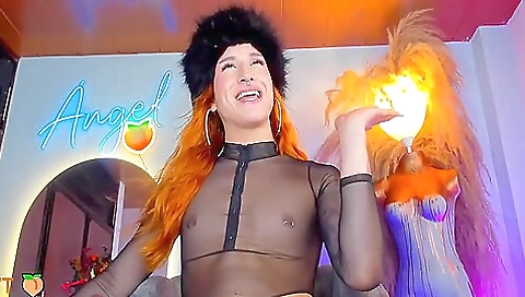 Red head blonde with a tattooed face enjoys a solo video