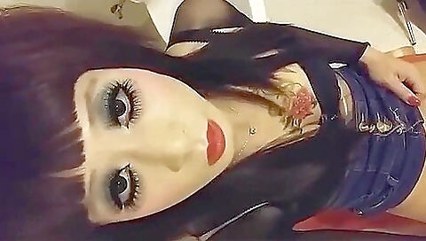 A brunette with a tattooed pussy is getting fucked in the ass