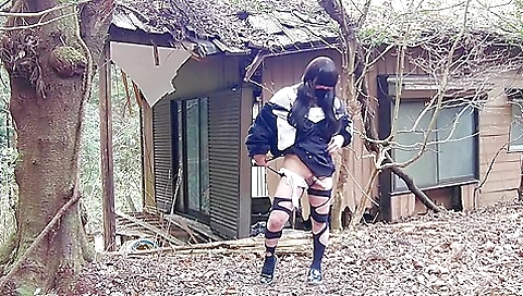 Japanese trans girl in stockings pissing in a abandoned house