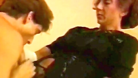 Brunette mature plays with dildo while her boyfriend is fucking her