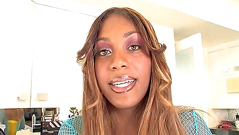 Sexy black girl with a tattooed pussy enjoys herself