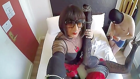 Busty brunette has her tits pulled and fucked in hotel room